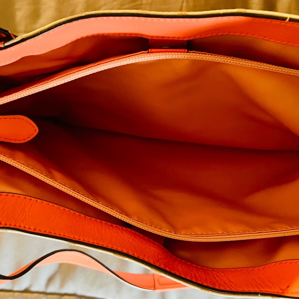 Medium coral and tan Coach bag. Used for 1 night. Basically new! Serial number - Picture 9 of 10